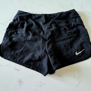 Women’s black Nike running shorts